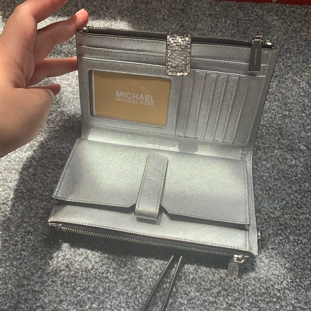 Michael Kors Silver  double zipper wristlet.